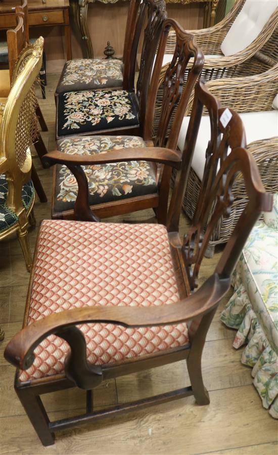 Four 19th century Chippendale style mahogany dining chairs, with drop in tapestry upholstered seats (one arm, three singles)